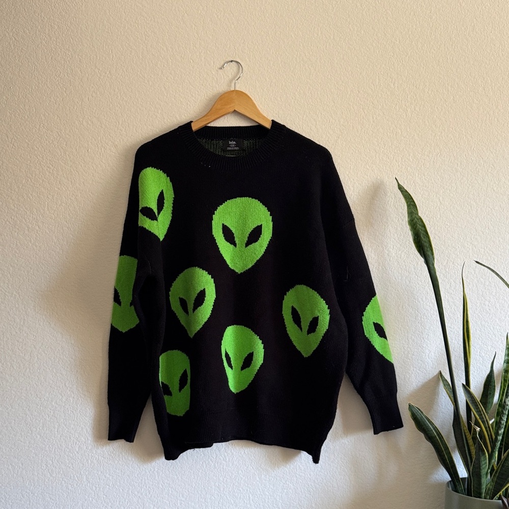 Dressed in LALA Black Sweater with Neon Green Alien Motif